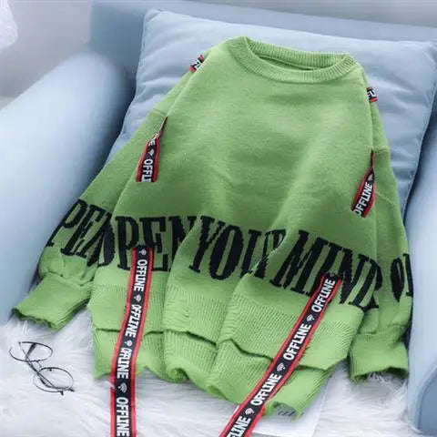 Sweter z taśmami